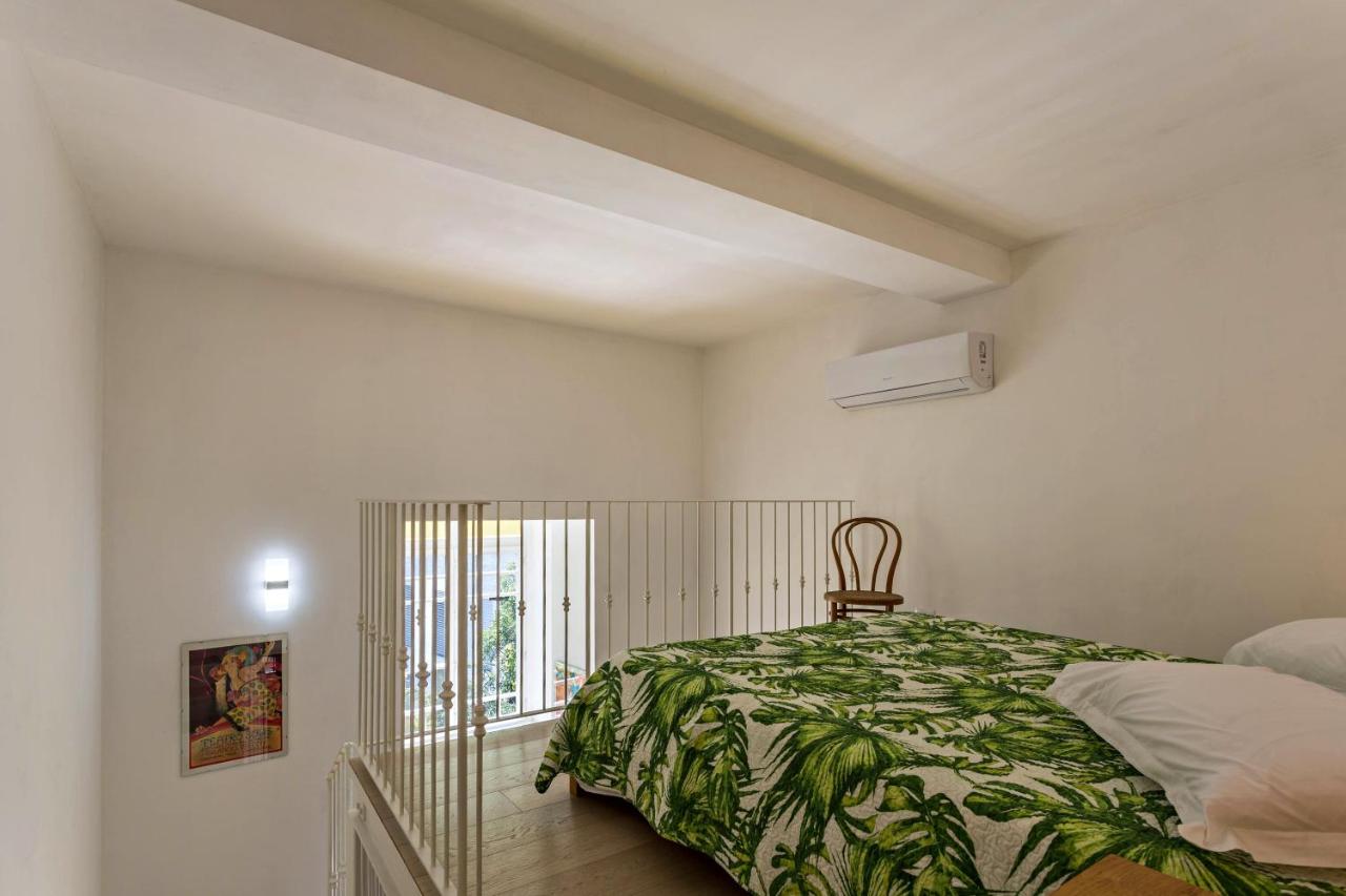 Lit ou lits dans une chambre de Garden Vista Lago